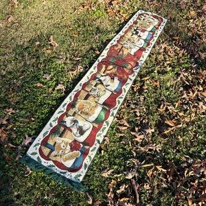 Christmas-themed tapestry table runner featuring cats in Christmas stockings.
